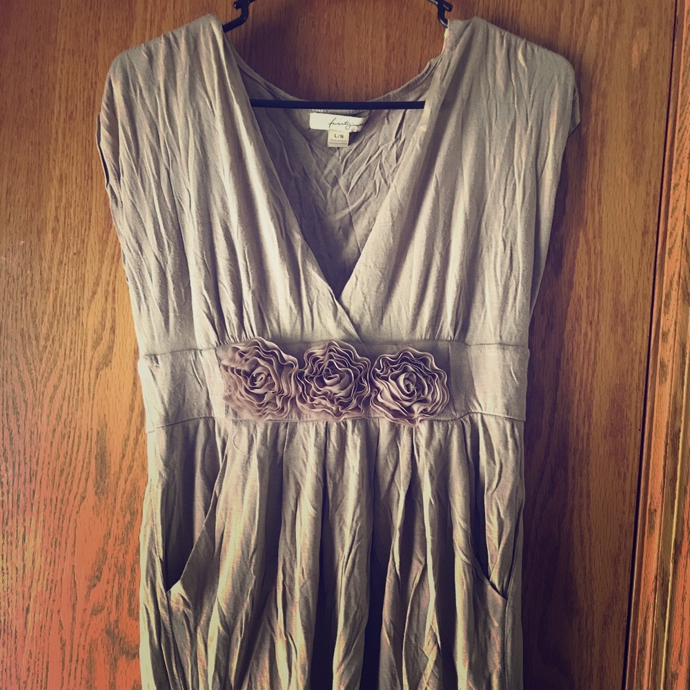 Sleeveless short beige colored dress